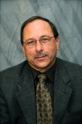 Portrait of Russ Slemko, Associate.