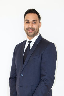 Portrait of Alim Mohamed, Associate.