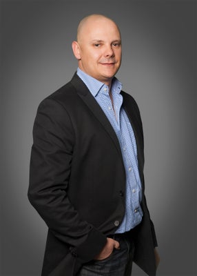 Portrait of Cory Lucas, Associate.