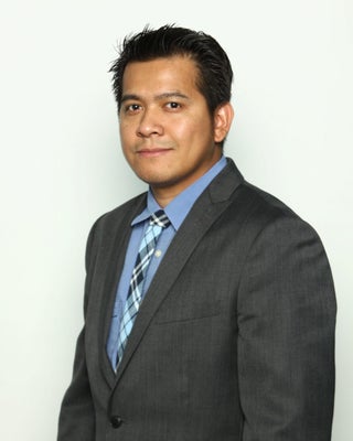Portrait of Michael Angelo Enciso, Associate.