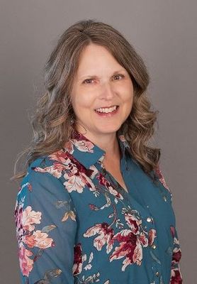 Portrait of Monica Arsenault, Salesperson.